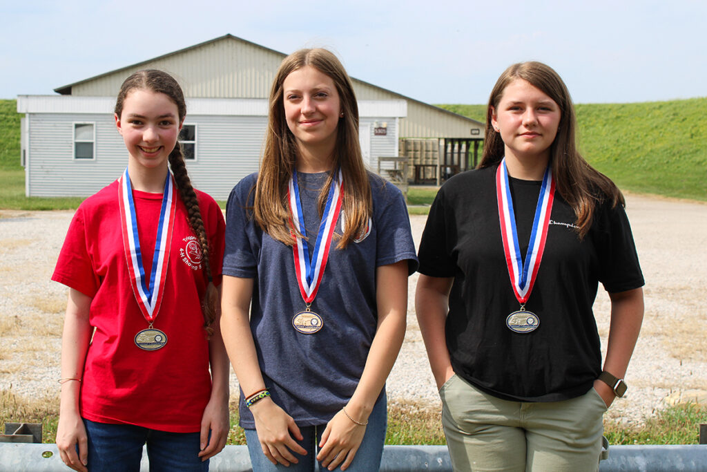 Award winners for the U15 category were: Alexandra Orr, Lafayette Gun Club (1st-center), Ashlyn Tilley, Carroll County 4-H (2nd-right) and Rebecca Ahrens, Trigger Time Shooting Education 4-H Club (3rd-left).