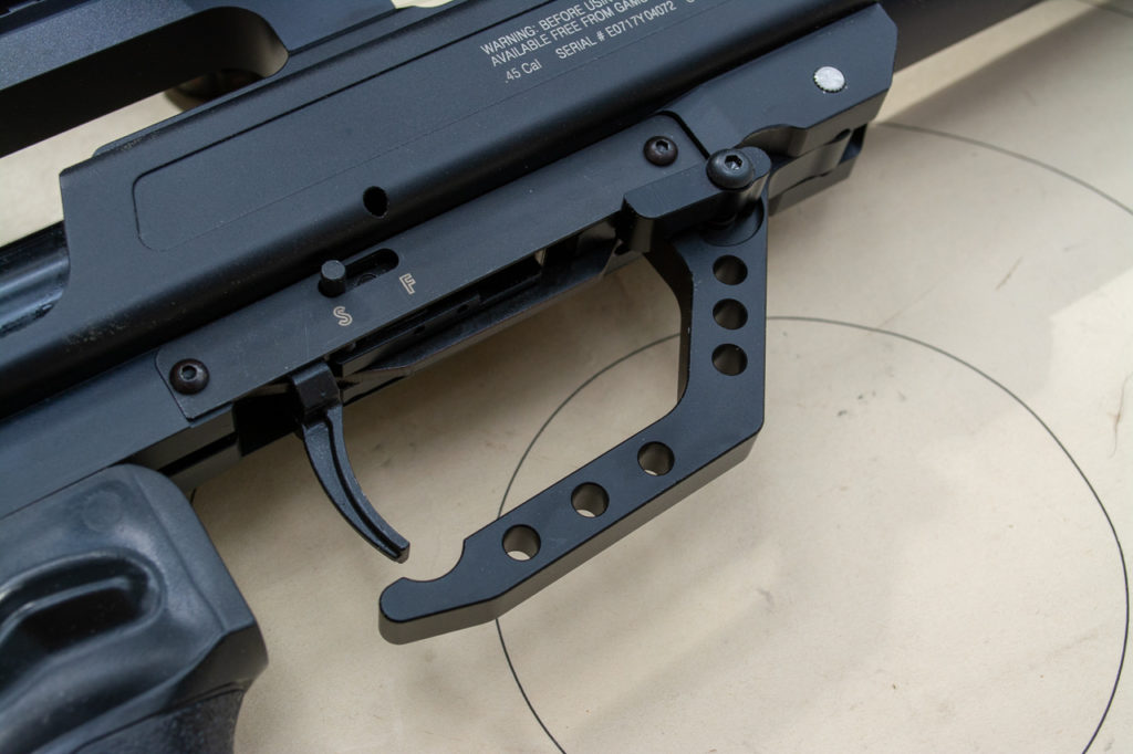 The cocking lever doubles as a trigger guard, thereby keeping the overall form factor of the TC-45 slender and sleek.