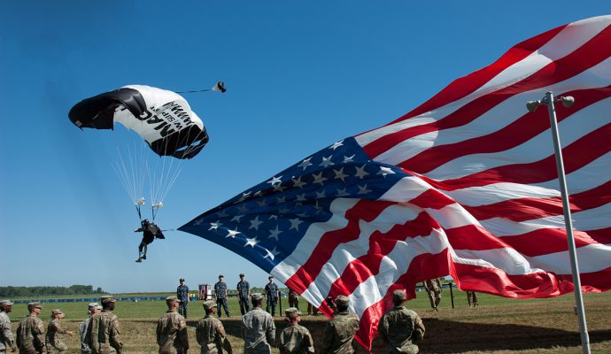 Gliding to the ground with SFC Bowman will also be an incredible 60-foot American flag.