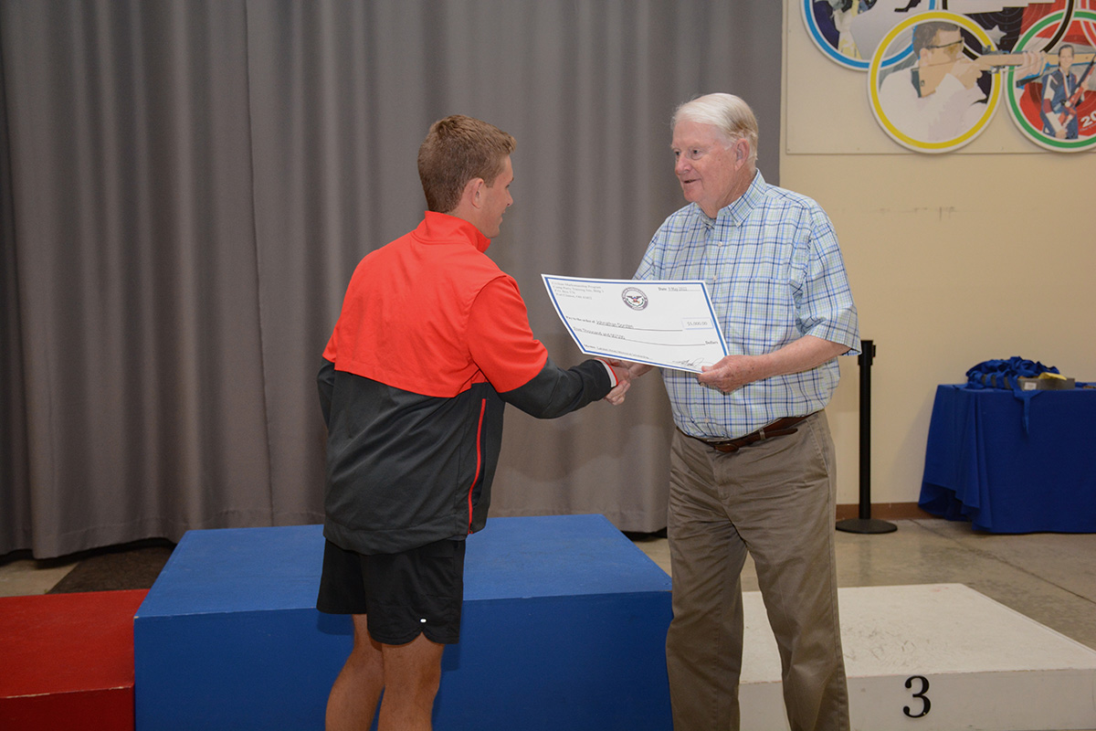 Dorsten received his scholarship check from DCM Emeritus and north air range namesake, Gary Anderson.