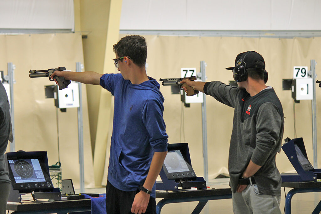 Nick Milev (right) was the overall athlete in the Junior Air Pistol event.