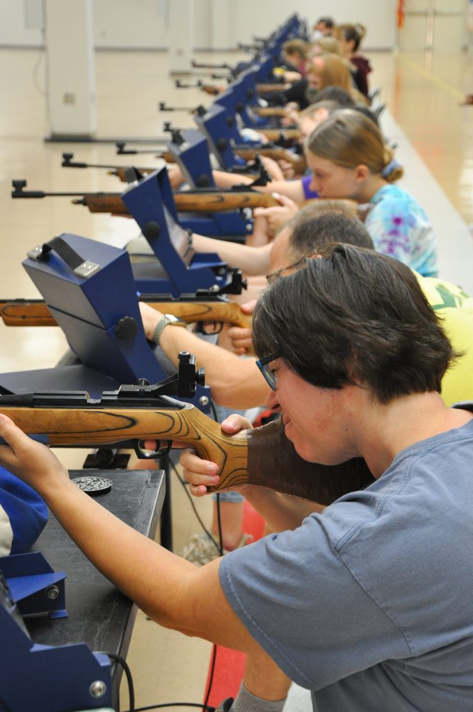 A Girl Scout troop takes a shot at marksmanship. The CMP Competition Centers are perfect for a group outing or a space to rent for your next gathering.