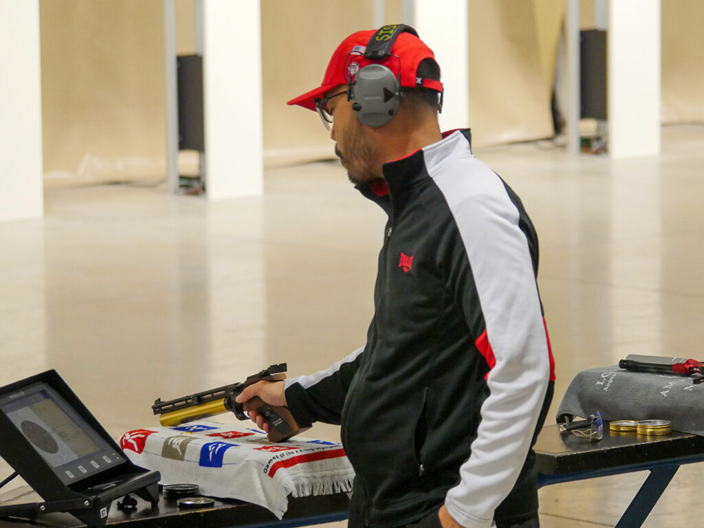 A competitor rests their arm between shots. Monthly Matches offer the opportunity to compete in Air Pistol, Precision and Sporter Air Rifle.