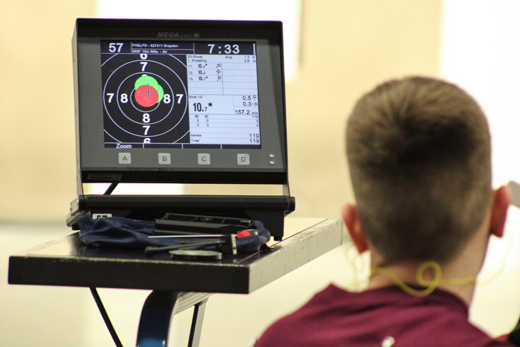 Participants in the National Air Gun Matches fire upon CMP’s line of indoor electronic targets.